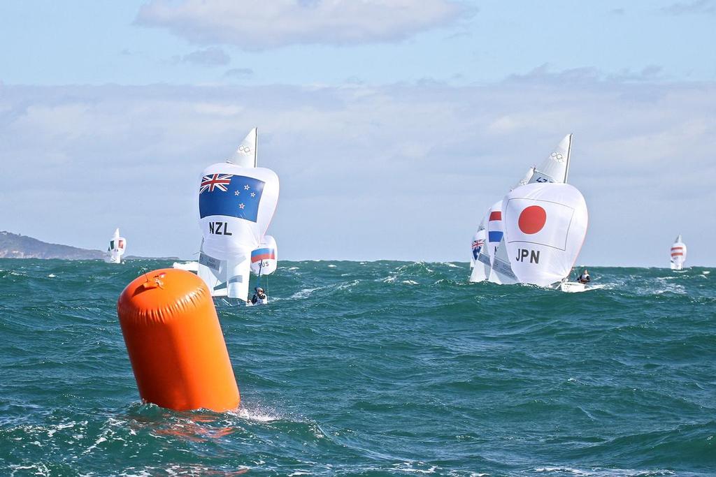 Womens 470 fleet approach bottom mark - NZL has already started their spinnaker drop in a safety first move. © Richard Gladwell www.photosport.co.nz